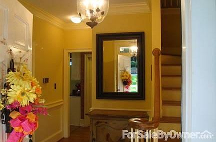 Foyer
						:
						Heavy wood trim. Main stairway shown