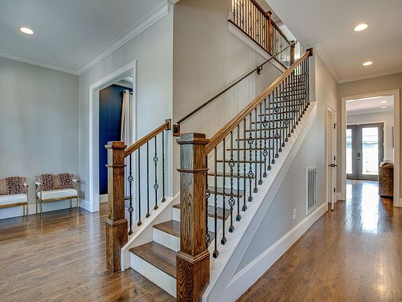 Stairwell to go to the 4 bedrooms upstairs