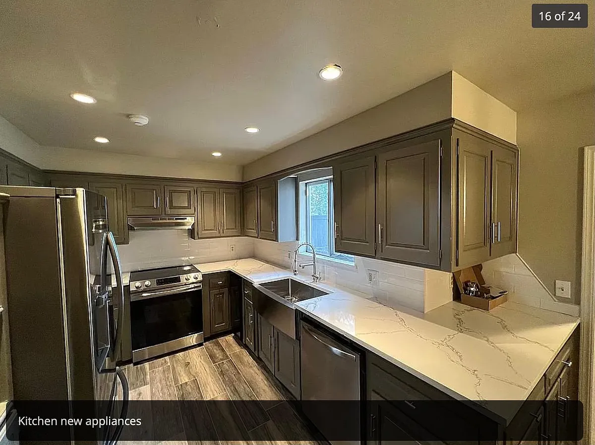 renovated kitchen with stainless steel appliances including wine fridge - 1508 Glenbrook Dr