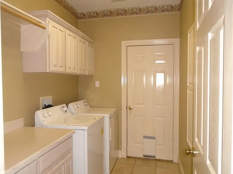 Utility room with washer & dryer