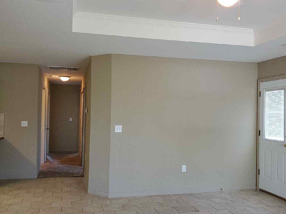 Hallway and open floor plan from living room to kitchen
