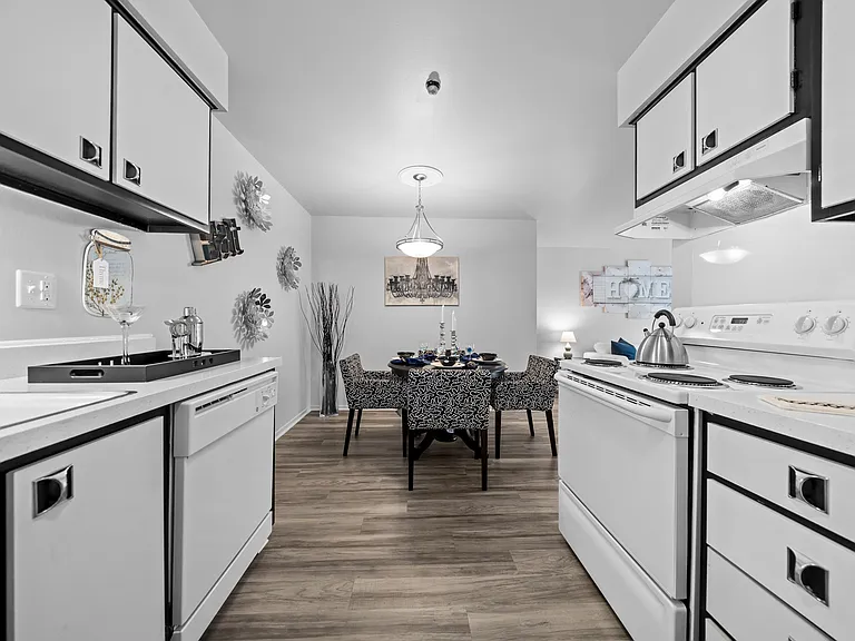 A modern kitchen at Westwood Village Apartments in Westland