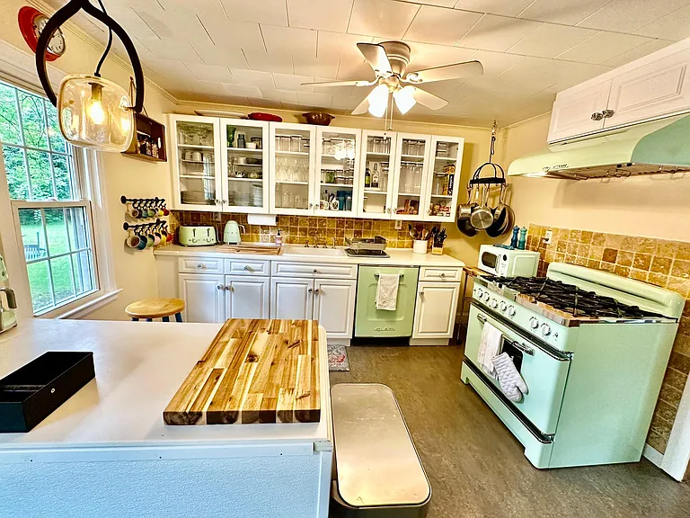 A fresh and modern kitchen, with brand new retro Big Chill and Smeg appliances.