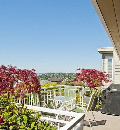 Sun filled view deck off of the kitchen/dining room.