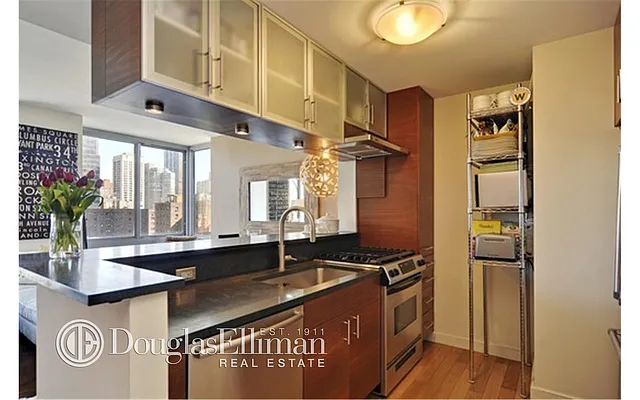 Sold by Douglas Elliman | media 9