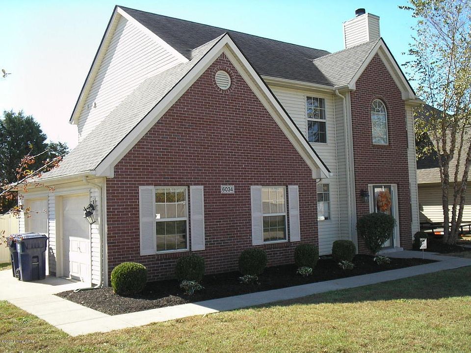 Front with view of garage