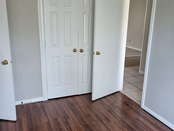 bedroom 1 with ceiling fan