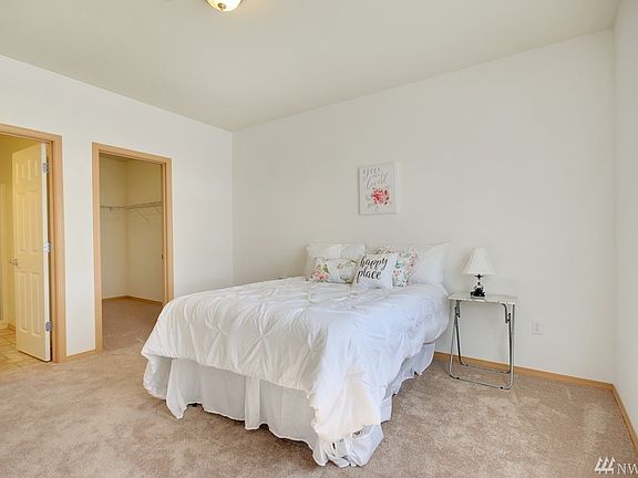 Huge Master Bedroom w/Walk in Closet and Attached 3/4 Private Bath. This is a Queen Sized Bed in the Photo. A King + More Furnit