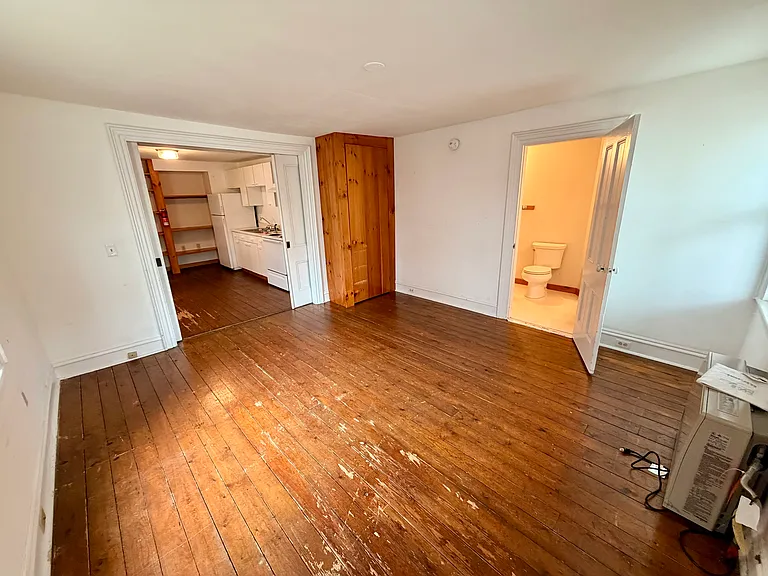 Different position in bedroom/living space. Closet in corner.