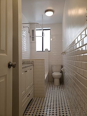 5th image of 300 W 49th St APT 200