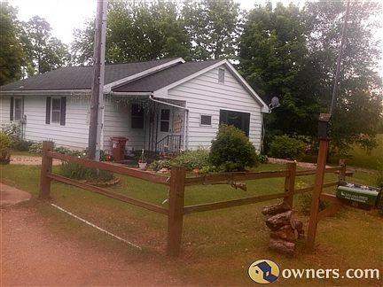 Front of house, garage to the left