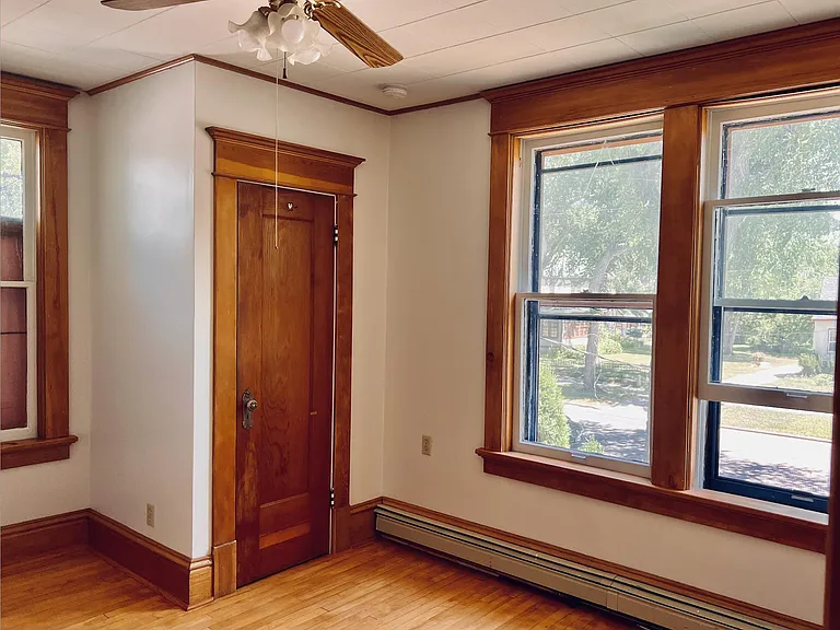 Bedroom with windows on the west side, facing 7th Street.