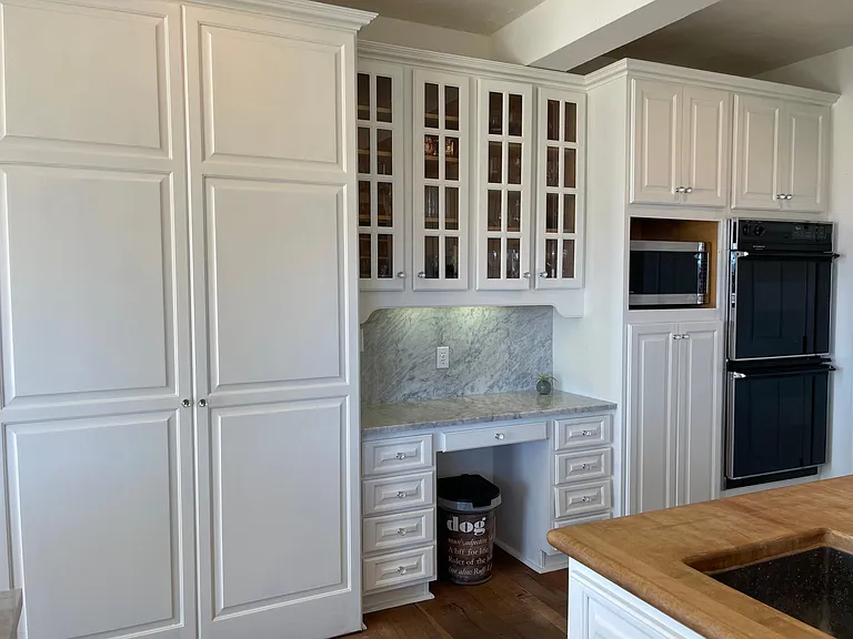 Large walk in pantry. Double electric ovens.