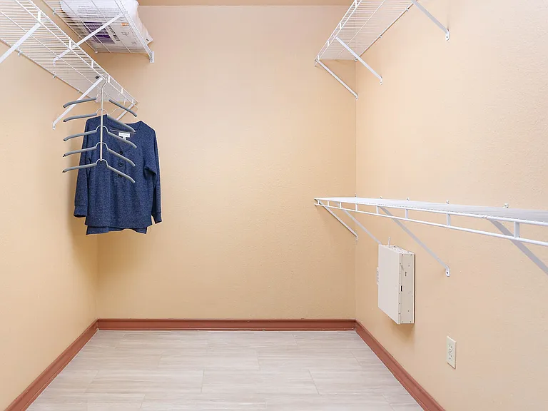 Huge closet in primary bedroom.