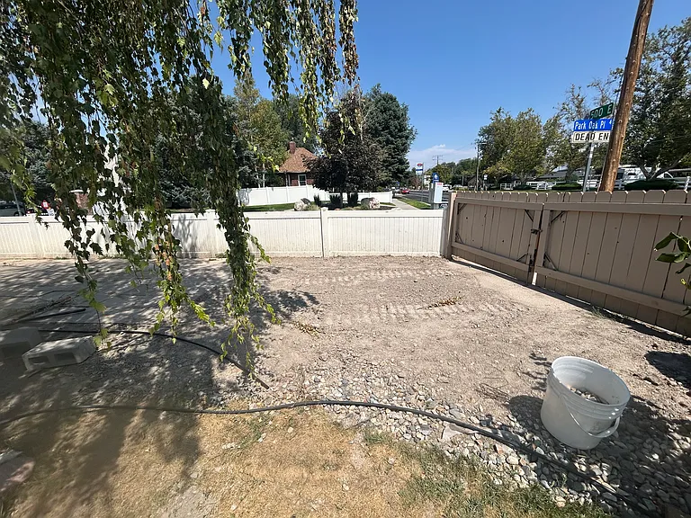 Upper unit driveway parking with latching gate. Front yard is fully fenced. Additional driveway parking available for additional fee for boats, RVs, trailers, etc. Garage parking annd/or storage
 available for an additional fee.