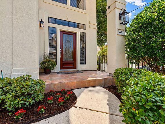 Greeted with custom tile porch, direct access to yard space over looking the manicured lawn.