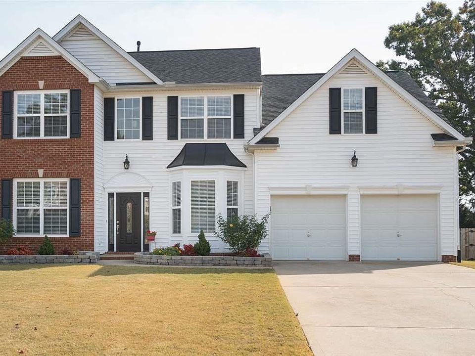 Wonderful 4 BR, 2 1/2 bath home with large bonus room. .6 acre lot with awesome lake view!