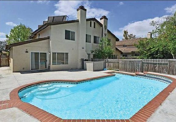 Backyard with pool and spa