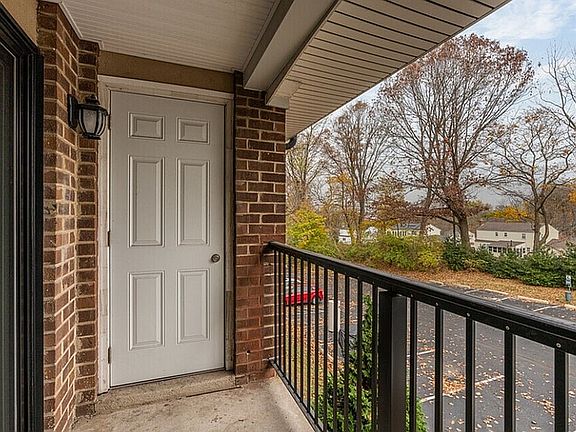 Step into tranquility on this charming balcony with peaceful views.