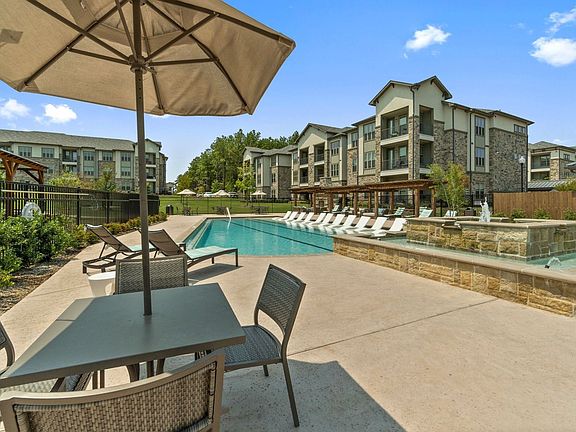 Resort-Style Pool with Expansive Sundeck