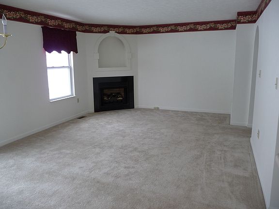 Large living room with gas fireplace
