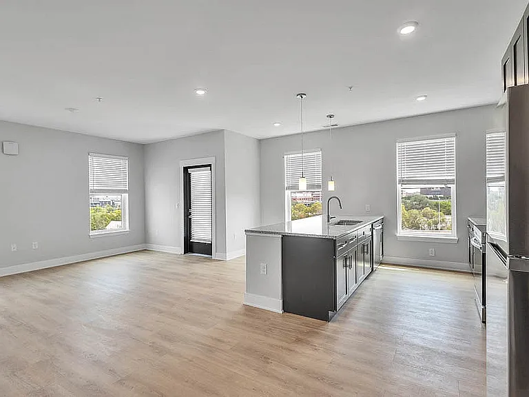 Bright & Open Concept Kitchen & Living Area