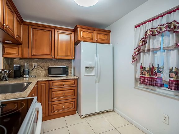 2nd image of 9401 Lime Bay Boulevard #209