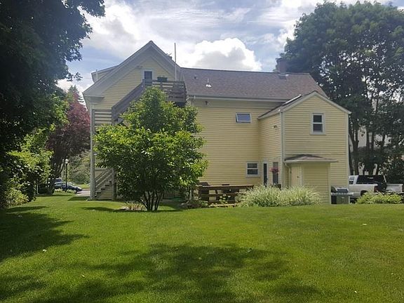 Desirable upper floor unit of a beautiful multi-family home with a great backyard, an inviting deck, and in a great location in the heart of North Easton.