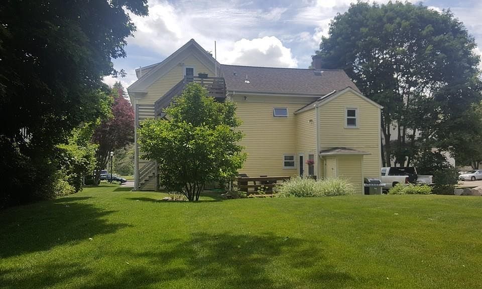 Desirable upper floor unit of a beautiful multi-family home with a great backyard, an inviting deck, and in a great location in the heart of North Easton.