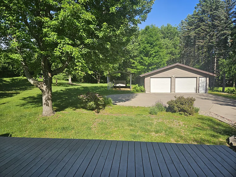 Detached and additional 2 car garage; A large, private, back yard