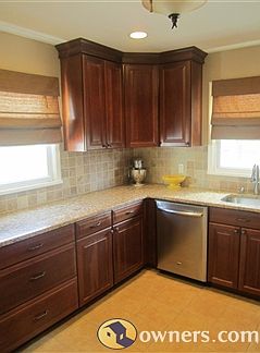 New Kitchen stainless steel appliances cherry cabinets granite