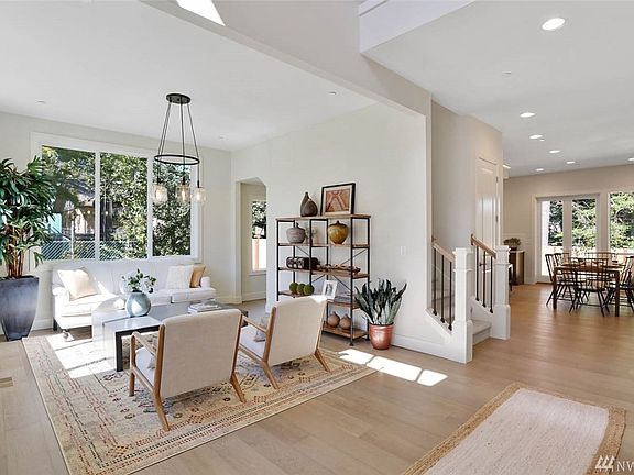Soaring 10 foot ceilings welcome you to this light-filled home.
