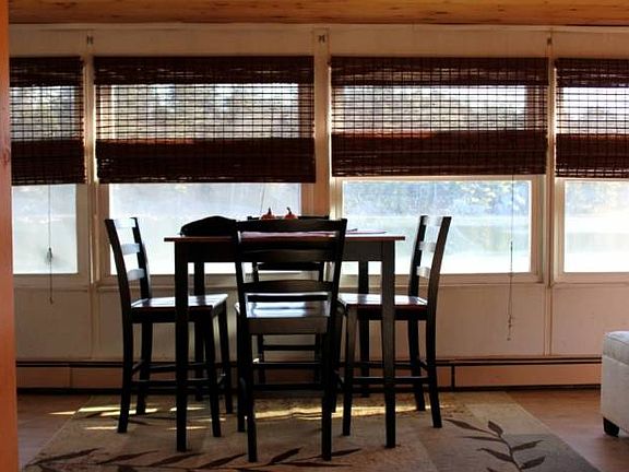 Dining w/wall of windows