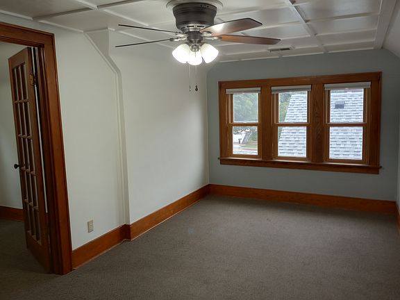 Master bedroom with a sunroom overlooking the south and east. This could also be a home office or nursery space