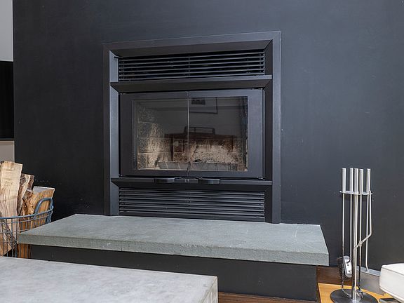 Wood burning fireplace/lounge.