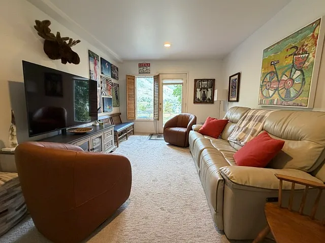 Den/playroom on lower level.