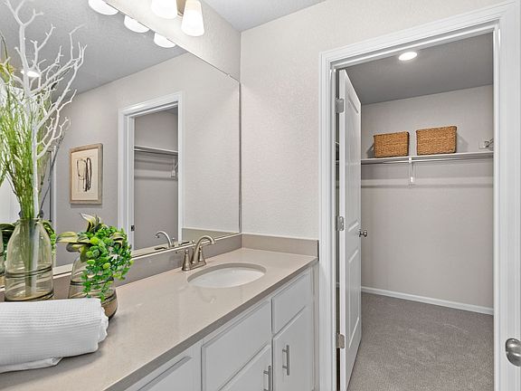 A view of the Primary Bedroom walk in closet