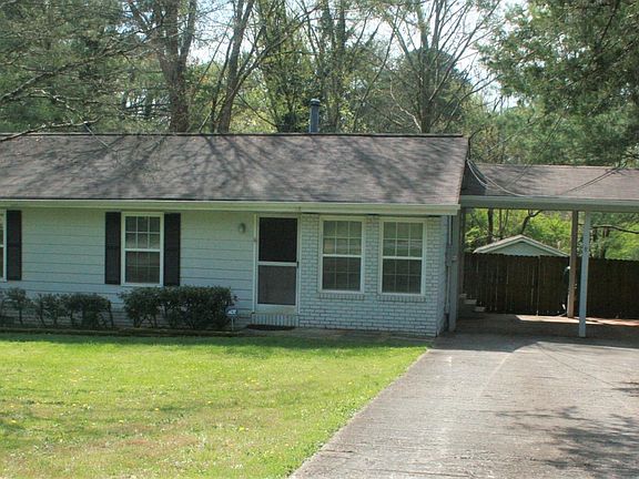 Exterior - 2 car covered parking, complely fenced in yard, large lot