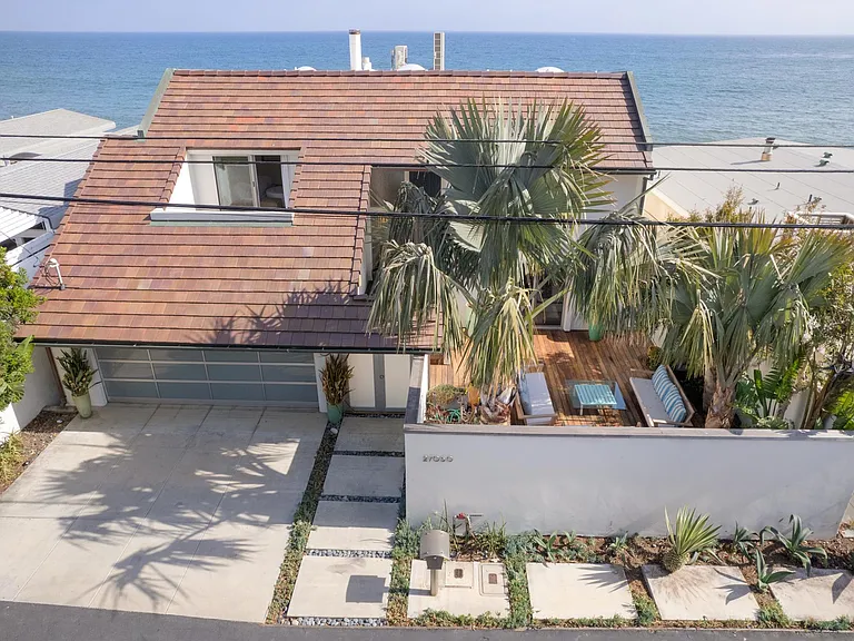 Surrounded by lush green natural features.