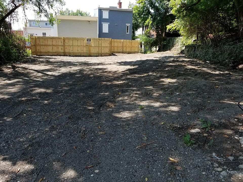 Parking lot in rear of building. Entrances in rear of build