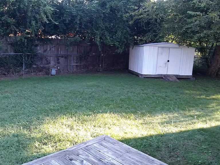 Back yard with shed.