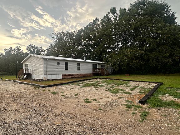 Rear Elevation and 2 parking spots available