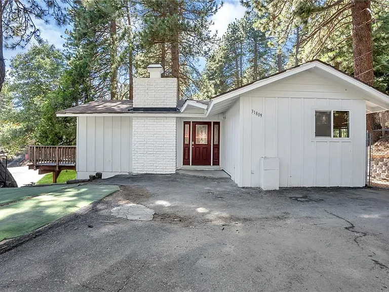 Welcome to 31809 Silver Spruce Drive located in the beautiful town of Running Springs, CA.