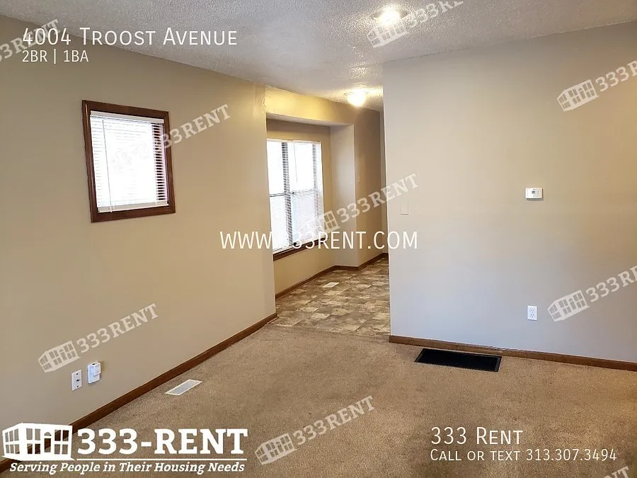 Large converted duplex close to UMKC & Rockhurst with old-world charm and stunning extras through... — Photo 4