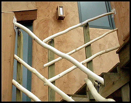 Balcony stair railings of Aspen wood latillas.