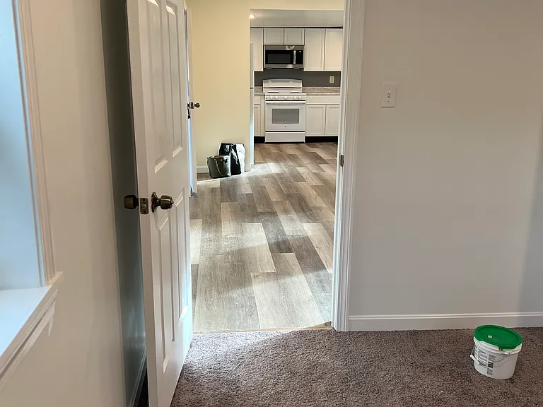 looking from second bedroom to living/kitchen area