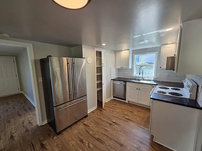 Kitchen includes built-in pantry.