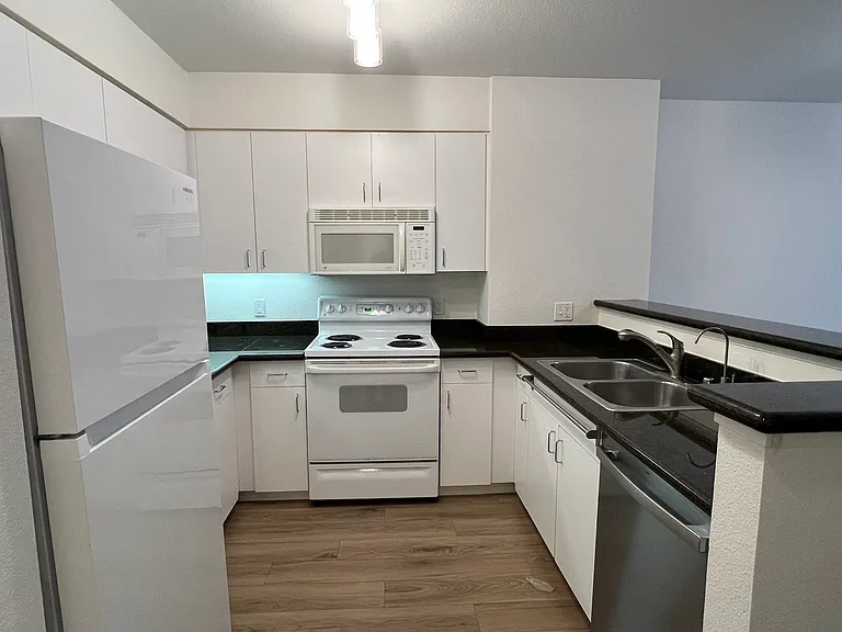 8100 Oceanview Ter #115 — Photo 2