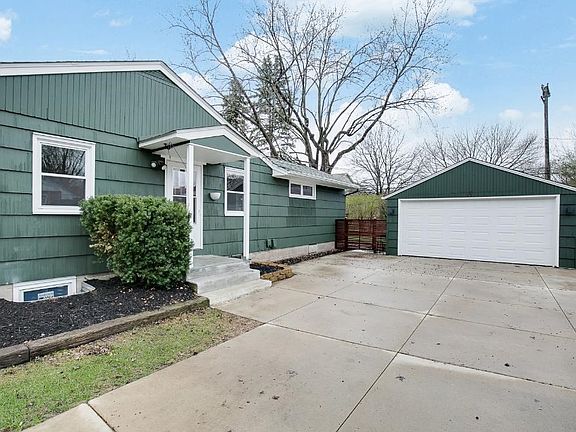 Front Side with 2 Car Garage