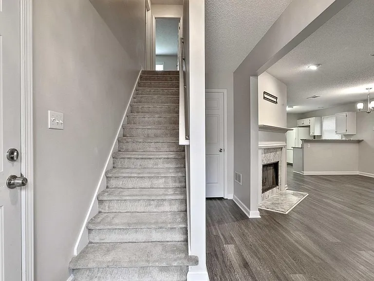 Upstairs to Two Bedrooms, Bath and Bonus Room